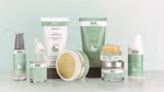 A range of REN Evercalm white and sage green bottles, tubes and jars that include biotech alternative ingredients