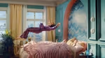 Person falling onto a bed