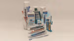 A collection of Mentadent products