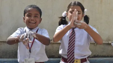 Children washing their hands