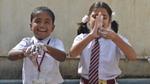 Children washing their hands