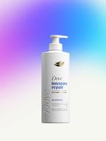 A bottle of Dove Intensive Repair shampoo with pump dispenser on a blue‑and‑purple gradient background.