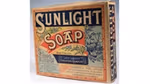 a vintage square bar of Sunlight soap in brown paper, branded packaging