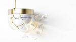 A jar of Dove’s premium Intensive Care hair repair mask, shattered and mended with molten gold in a Kintsugi style.