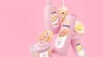 Promotional banner for a limited-edition Dove x Crumbl collaboration. The image features a pink background with cookie visuals and Dove-branded personal care products.